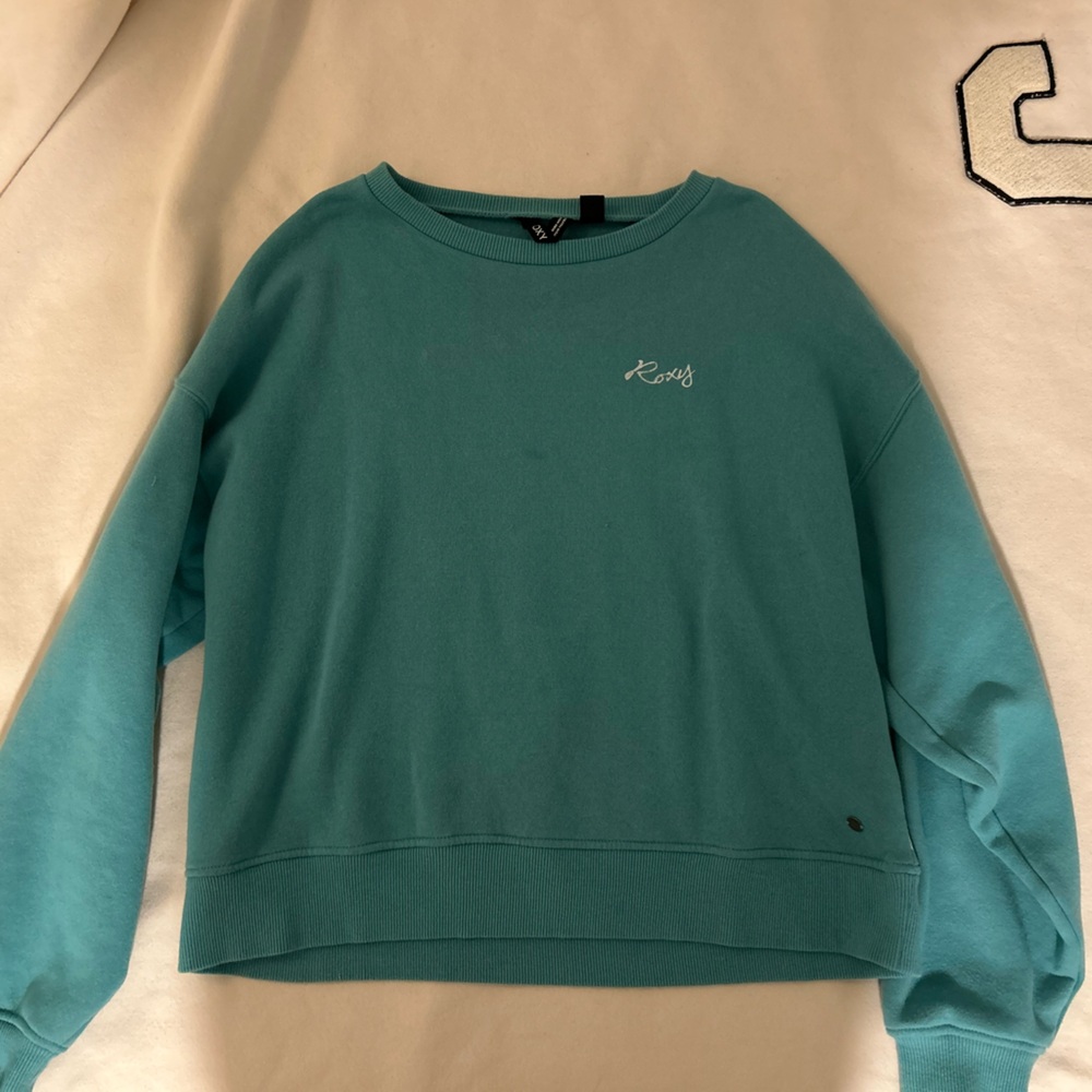 Roxy! teal crew neck, size small, simple wave design. Worn once, good condition!